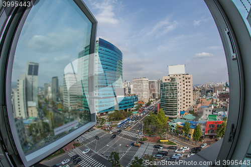 Image of Traffic on city streets. Window view to Seoul, South Korea