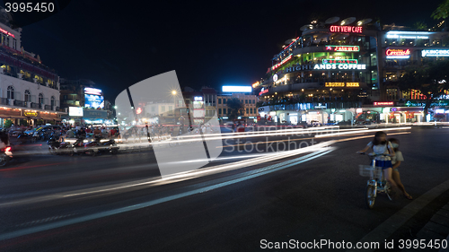 Image of Night city street with transport in motion. Hanoi, Vietnam