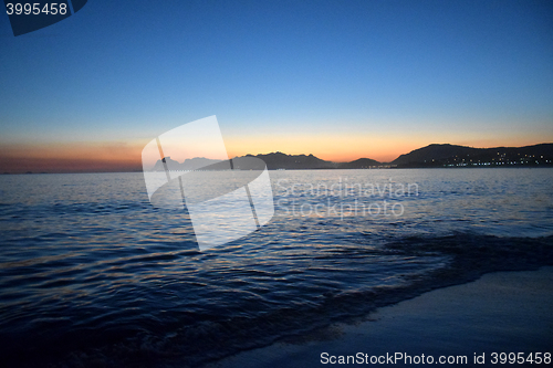 Image of Colored sunset on the beach in Rio de Janeiro