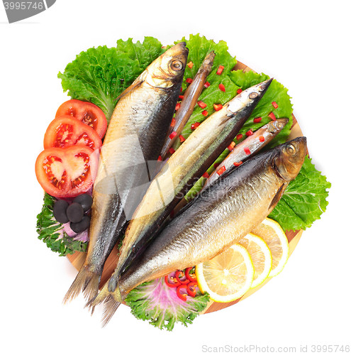 Image of fish with lemon on plate