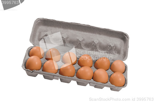 Image of brown eggs in a carton package