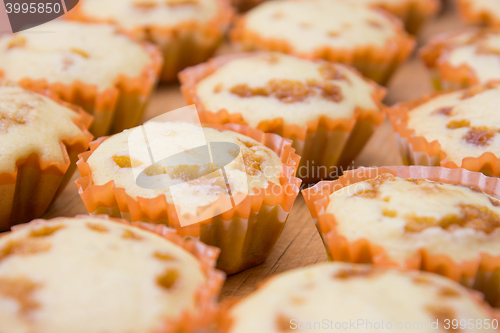 Image of Freshly baked muffins stuffed with caramelized milk closeup