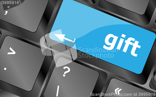 Image of Computer keyboard with gift key - business background. Keyboard keys icon button vector