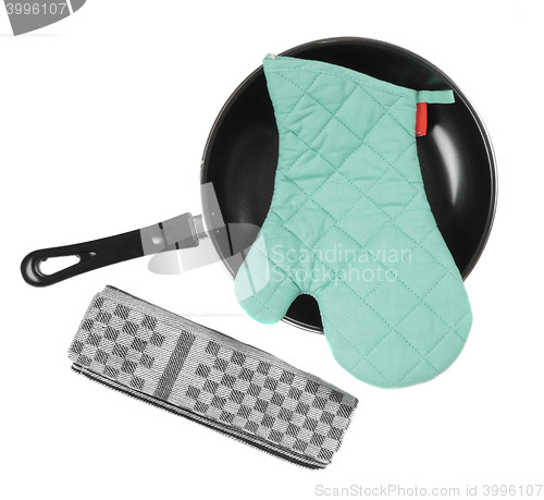 Image of Kitchen glove in pan with grater isolaetd