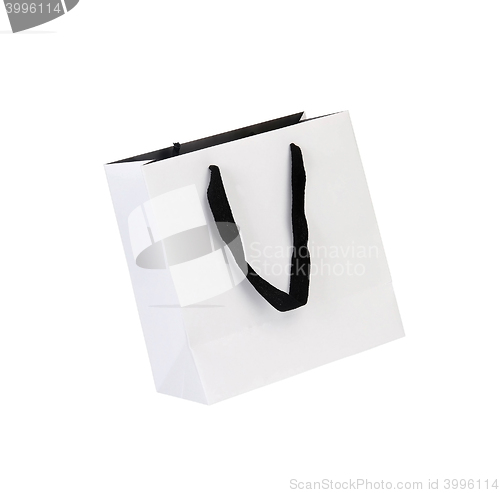 Image of White beamless paper-bag with cords.