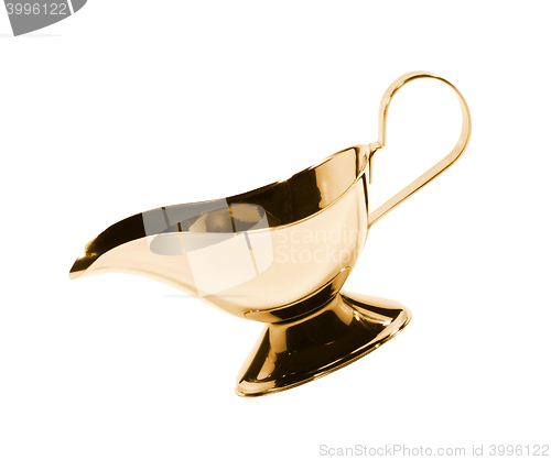 Image of Old-fashioned antique precious golden sauce boat