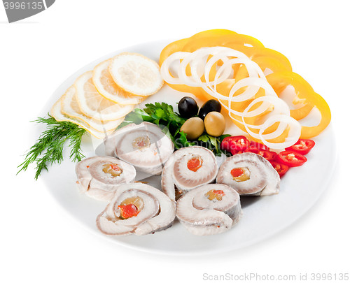 Image of fish with vegetables and olives