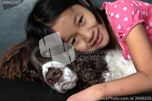 Image of Child and dog