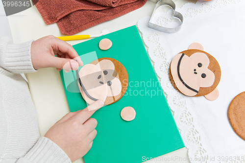 Image of Children making christmas gingerbread