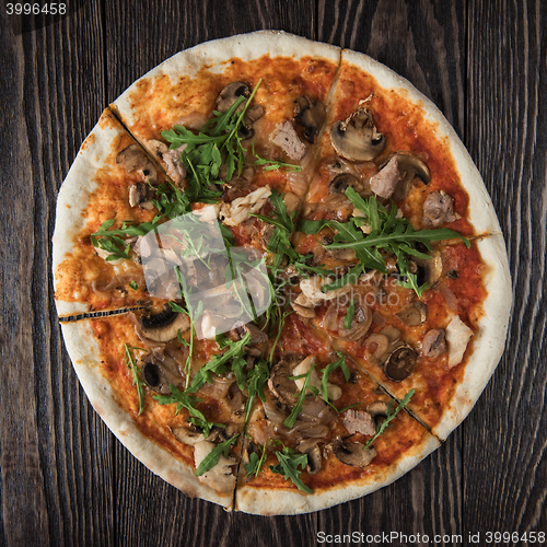 Image of Pizza with chicken and mushrooms