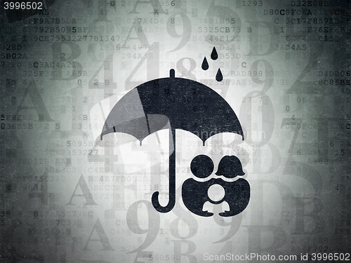 Image of Security concept: Family And Umbrella on Digital Data Paper background