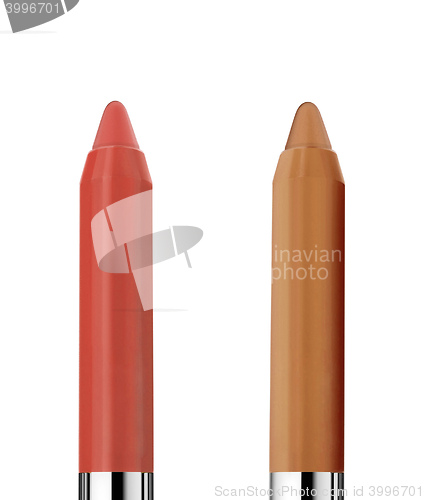 Image of two make up pencils isolated on white