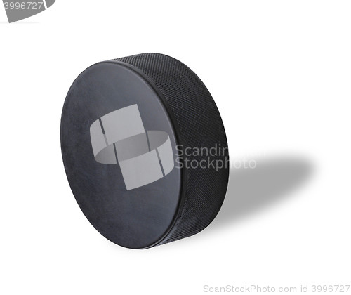 Image of hockey puck isolated on white background