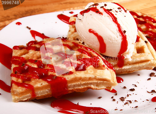 Image of sweet pancakes with creem and ice cream