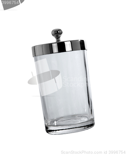 Image of Empty glass bottle standing on white background