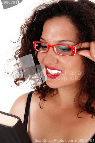 Image of Closeup of woman with red glasses.