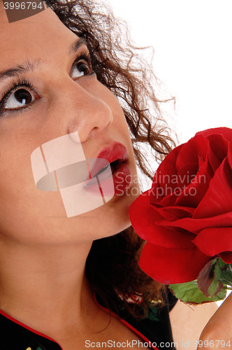 Image of Face of woman with red rose.