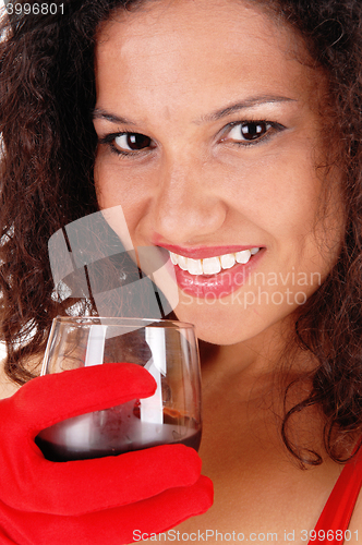 Image of Smiling woman with wineglass.