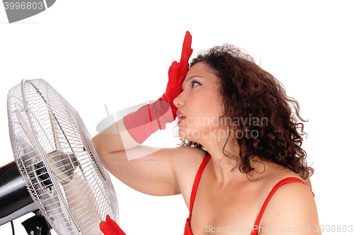 Image of Hot woman with big fan.