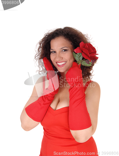 Image of Woman in red dress and cloves.