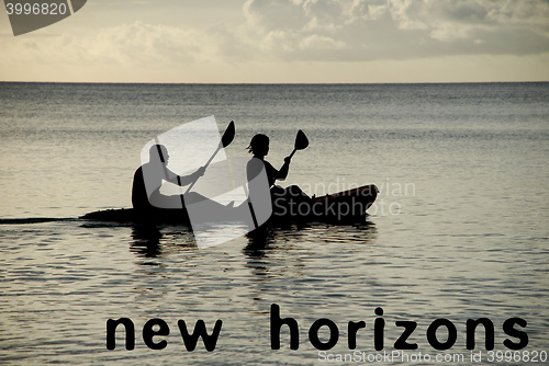 Image of Kayakers silhouetted on the ocean, NEW HORIZONS as concept text