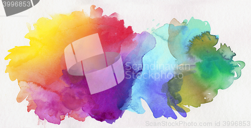 Image of rainbow colored watercolor paints on paper