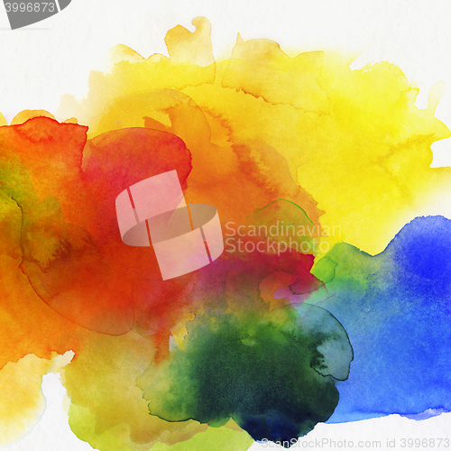 Image of rainbow colored watercolor paints on paper