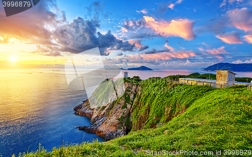 Image of Beautiful lighthouse in sunrise