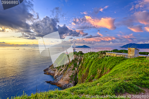 Image of Beautiful lighthouse in sunrise