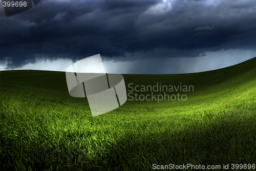 Image of Green land over a storm