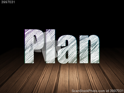 Image of Finance concept: Plan in grunge dark room