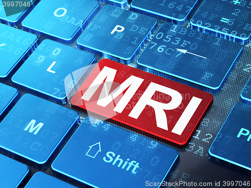 Image of Medicine concept: MRI on computer keyboard background