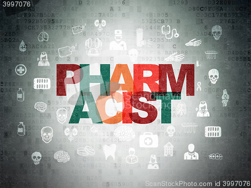 Image of Healthcare concept: Pharmacist on Digital Data Paper background