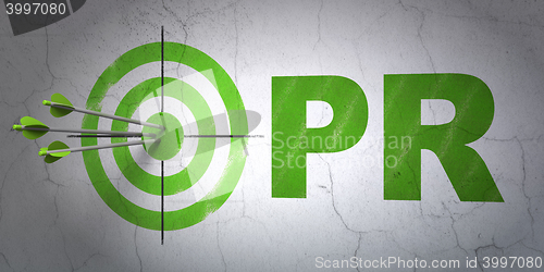 Image of Marketing concept: target and PR on wall background