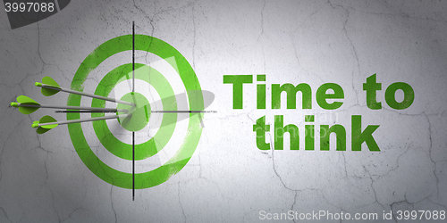 Image of Time concept: target and Time To Think on wall background