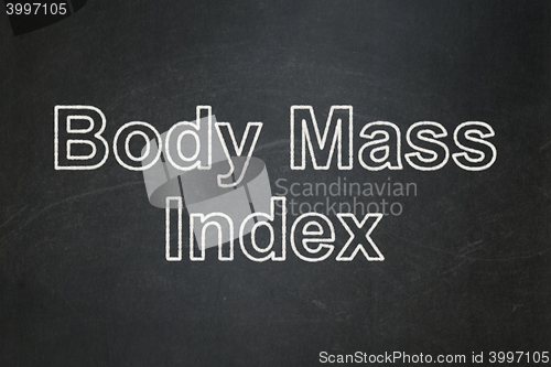 Image of Healthcare concept: Body Mass Index on chalkboard background