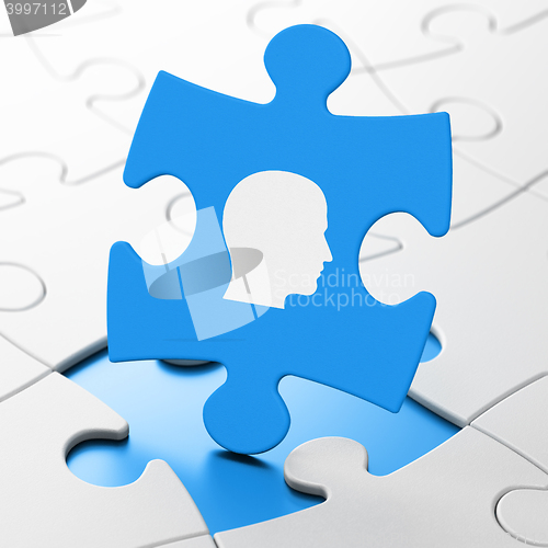 Image of Advertising concept: Head on puzzle background