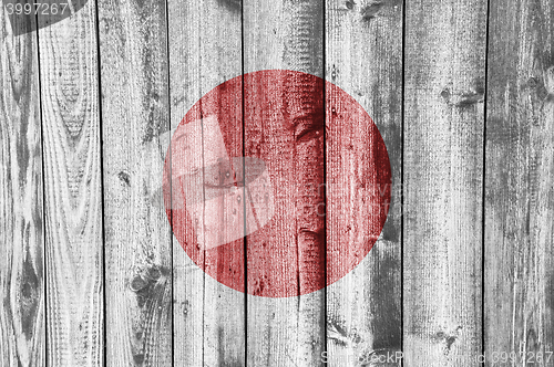 Image of Flag on weathered wood