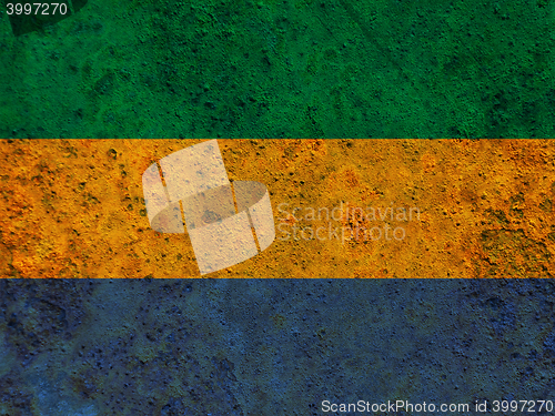 Image of Flag on rusty metal