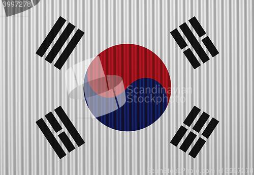 Image of Flag on corrugated iron