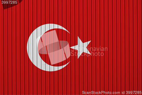 Image of Flag on corrugated iron