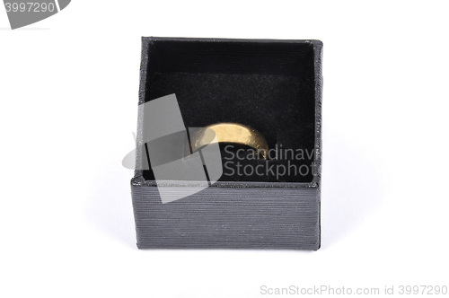 Image of Jewel box with golden wedding ring