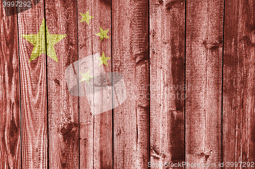 Image of Flag on weathered wood