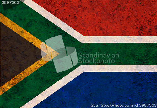 Image of Flag on rusty metal