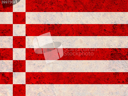 Image of Flag on rusty metal