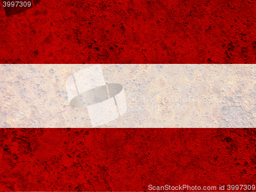 Image of Flag on rusty metal