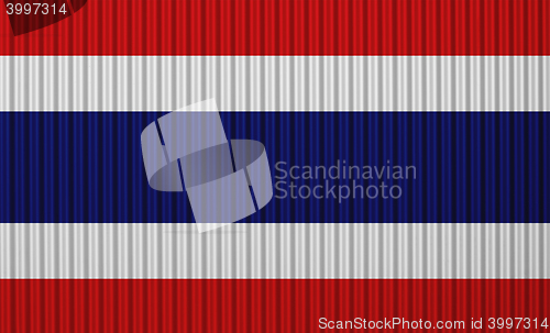 Image of Flag on corrugated iron