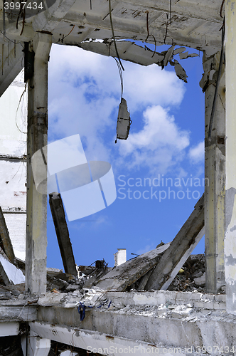 Image of Pieces of Metal and Stone are Crumbling from Demolished Building Floors