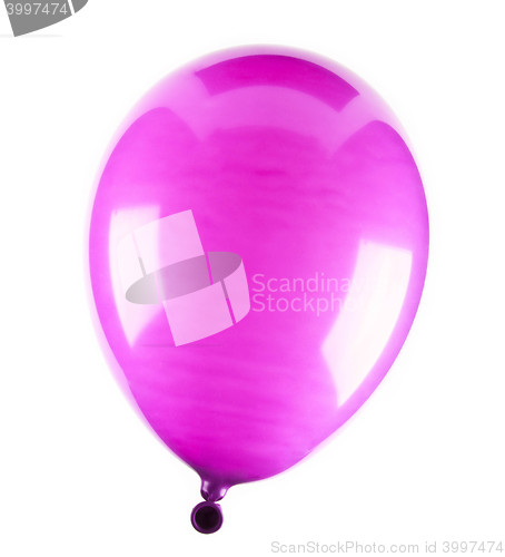 Image of Vibrant pink balloon isolated on white