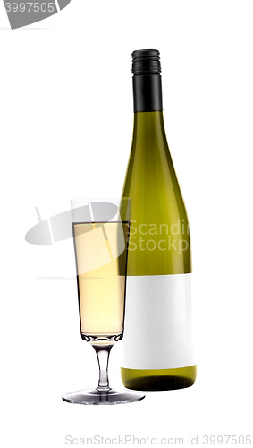 Image of Full white wine glass goblet and bottle isolated